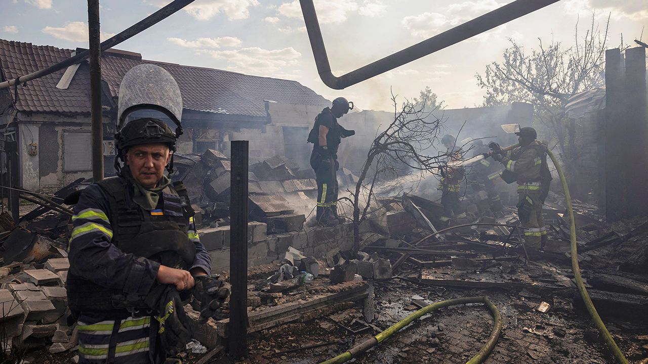 Emergency workers extinguish a fire that destroyed a private house after a Russian strike in Pokrovsk